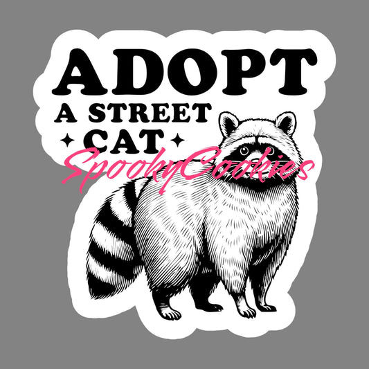 Adopt a Street Cat’ Sticker – Funny Raccoon Meme Decal, Animal Adoption Humor